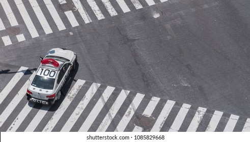 TOKYO, JAPAN - MAY 5TH, 2018. Aerial View Of Japanese Police Car On The Road In Shibuya.