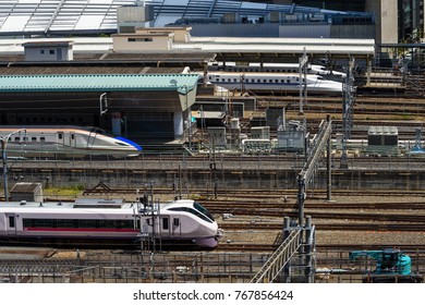 TOKYO, JAPAN - MAY 8, 2017: Top View Of Many Shinkansen Trains At Platform To Pick Up Passengers In Tokyo Station. Bullet Train Or Super High Speed Railway Operated By Japan Railways Companies.