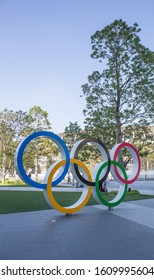 TOKYO, JAPAN - NOVEMBER 1, 2019: A Large, Colorful Statue Of The Olympic Rings Stands Near The New Stadium Park Ready For The 2020 Tokyo Olympics. 