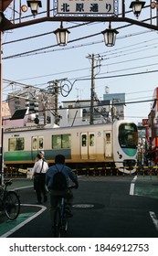 TOKYO, JAPAN - NOVEMBER 1, 2019: A Train (Seibu Shinjuku Line) Passes Through The Nogata Shopping Street In Nakano District, Tokyo. Soft Focus, Selective Focus.