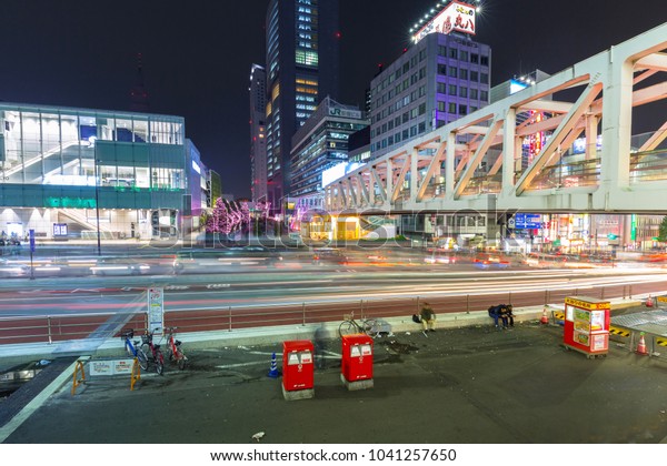 Tokyo,\
Japan - November 14, 2016: Cityscape of Shinjuku district with\
traffic lights on the street of Tokyo, Japan. Tokyo Metropolis is\
both the capital and most populous city of\
Japan.