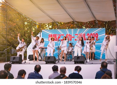 Tokyo, Japan - November 16 2019: Tokyo Brass Style Girl Group Waving Goodbye To Audience During Nerima Anime Carnival 2019 Annual Event At Nerima Ward Called The Birthplace Of Animation Of Japan.