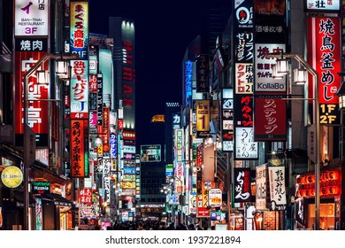 Tokyo, Japan - November 18, 2018: Advertisement billboards and signs on Kabukicho Ichiban-gai street in Shinjuku's nightlife district. The area is an entertainment and red-light district.