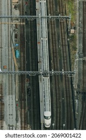 TOKYO, JAPAN - NOVEMBER 2, 2018 : Shinkansen (Japanese Bullet Train) On A Track, Top View From Tokyo Sky Tree In Tokyo. Some Motion Blur. Soft Focus And Blurred Image.