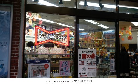 Tokyo, Japan - November 21 2021: A Budweiser Neon Sign At A Liquor Store In Tokyo.