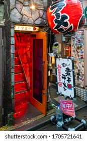 TOKYO, JAPAN- NOVEMBER 23, 2019 : Small  Bar Entrance In Shinjuku  Golden Gai. Tokyo, Japan. Over 200 Tiny Bars Are Squeezed Into This Area.