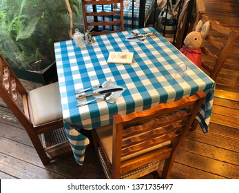 TOKYO, JAPAN - NOVEMBER 27, 2017: A Rabbit Sitting Alone On A Dining Table In Peter Rabbit Restaurant In Japan.