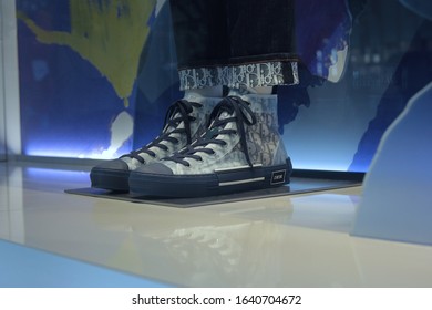 Tokyo, Japan - November 30, 2019: Christian Dior Sneakers And Jeans Window Display In Omote Sando Retail Shop.