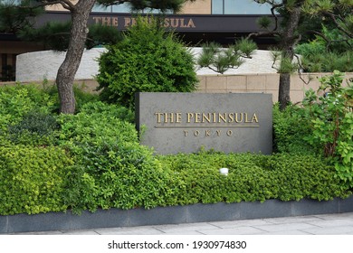 TOKYO, JAPAN - November 8, 2020: The Peninsula Hotel Sign In Tokyo's Hibiya Area.