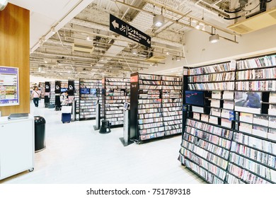 Tokyo, Japan, October 2017: CD And DVD Rental Store Interior In Shibuya District. Japanese People Renting CDs And DVDs