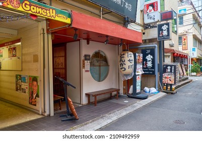 Tokyo, Japan - October 24, 2019: The View Of The Small Street With Indian Restaurant And Bar Ganesha At The Central Tokyo. Japan