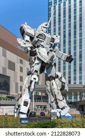 Tokyo, Japan - October 28 2019: Japanese Giant Life-sized Robot Statue Called RX-0 Unicorn Gundam Of The Manga And Anime Series Mobile Suit Gundam Unicorn Standing With Legs Apart In Odaiba.
