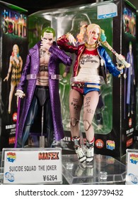 Tokyo, Japan - October 30, 2018: Close Up Of Joker And Harley Quinn Figures On Display Shelf At Yamashiroya Store In Ueno, Tokyo, Japan. Suicide Squad Is A 2016 American Superhero Film Based On The DC