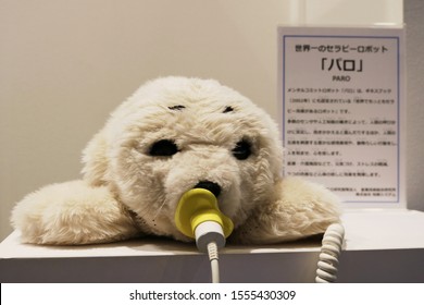 TOKYO, JAPAN - October 30, 2019: A PARO Therapeutic Robot Seal On A On Display In Tokyo.