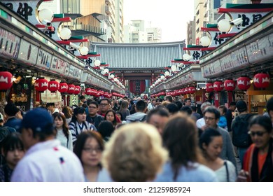 Tokyo, Japan - October 31st 2019: Crowded visitors on the shopping alley near Sensō-ji temple, Asakusa
