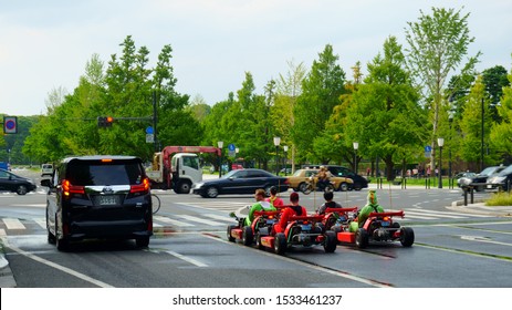 Tokyo / Japan - Sept 17 2018: Tourists Tour Around Tokyo On Go Karts Dressed As Characters Such From The Nintendo Game Mario Kart