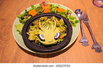 Tokyo, Japan - September 12, 2019 -Pasta With Salad Topped With A Piece Of Bread That Looks Like The Pokémon Celebi At The Pokémon Café In Nihonbashi, A Limited Menu During Halloween Season