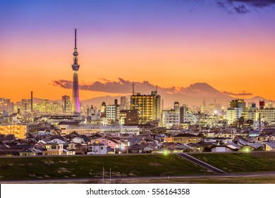 Tokyo, Japan Skyline With Mt. Fuji And Tower.