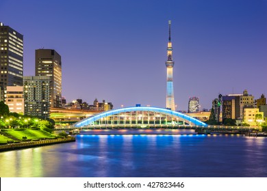 Tokyo, Japan Skyline On The Sumida River At Night.