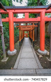 Tokyo - July 27, 2017: Torii Gate Path At Hanazono Inari Jinja Shrine Which Enshrines Ukanomitama Deity. Located In Ueno Park, Tokyo