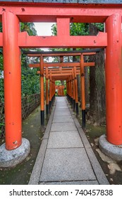 Tokyo - July 27, 2017: Torii Gate Path At Hanazono Inari Jinja Shrine Which Enshrines Ukanomitama Deity. Located In Ueno Park, Tokyo