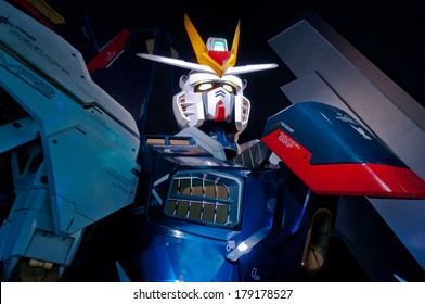 TOKYO - MAY 2 2012: A life size Gundam is displayed at Gundam Front in Odaiba, Tokyo. The Gundam Series is a metaseries of space  anime, create in 1979, that features giant robots called "Mobile Suits