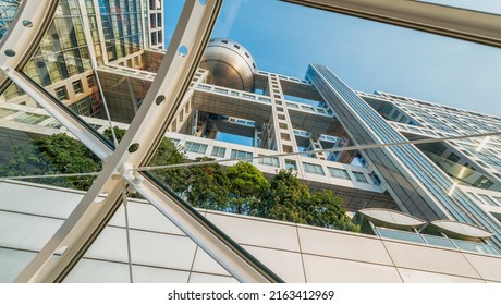 TOKYO - MAY 22, 2016: Fuji TV Headquarters Modern Buildings. It Is A Futuristic Metallic Clad Building Featuring A Massive Silver Ball 32 Metres In Diameter.