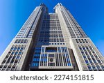 Tokyo Metropolitan Government Building with blue sky during warm sunny day