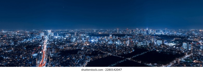 Tokyo Shinjyuku and Shibuya area panoramic view at night. - Powered by Shutterstock