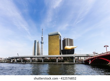  Tokyo skyline along the Sumida River including landmarks such as the Skytree and the Asahi headquarters shown in Tokyo, Japan