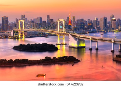 Tokyo skyline with Tokyo tower and rainbow bridge. Tokyo, Japan.
