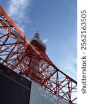 Tokyo Tower red tower blue sky low angle