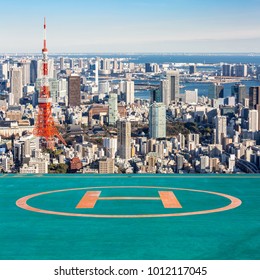 Tokyo Tower With Skyline In Tokyo Japan With Helipad