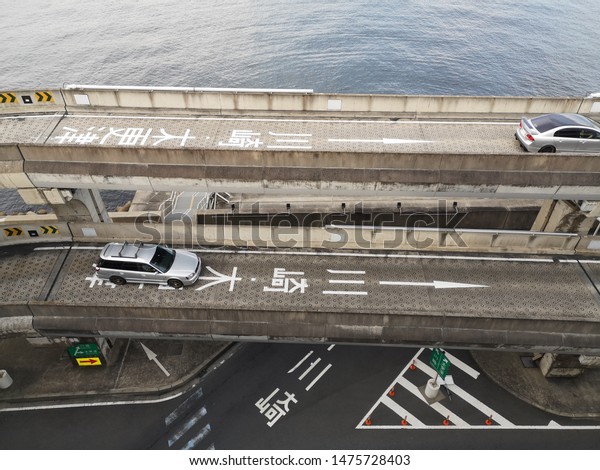 Tokyo,Japan/Jan 11,2019:distant view of Tokyo\
area from Umihotaru high way rest area artificial island on gulf of\
Tokyo, Tokyo bay Aqua line\
Umihotaru.