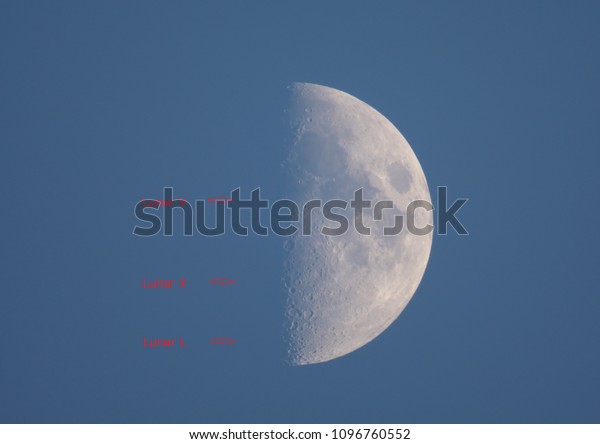 Tokyo,Japan-May 22, 2018: Three alphabets, V,X\
and L, appear on the surface of the moon around 6PM. This\
phenomenon is called as Lunar V, Lunar X and Lunar\
L