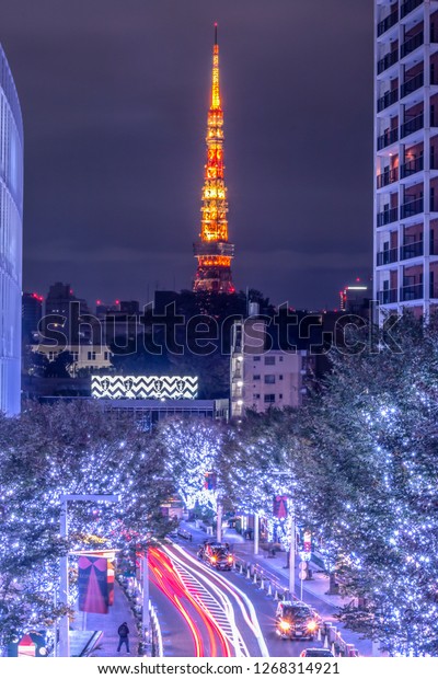 TOKYO,JAPAN-November
16,2018;Keyakiza Illumination 2018 or Roppongi Hills Christmas 
Illumination 2018 with  Tokyo tower in background  in Keyakiza dori
street
,Roppongi,Tokyo,Japan.
