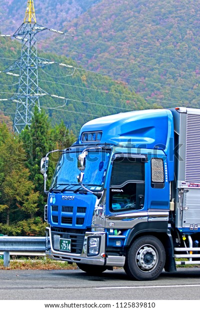 TOKYO-JAPAN-OCTOBER 24 : The\
transportation truck on the road in Japan, October 24, 2015 Tokyo\
Japan