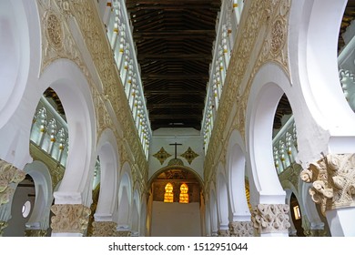 TOLEDO, SPAIN -22 JUN 2019- View Of The Landmark Santa Maria La Blanca, A Converted White Catholic Church In The Former Ibn Shushan Synagogue In The Former Imperial City Of Toledo In Castile La Mancha