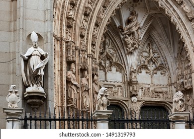 TOLEDO, SPAIN - APRIL 24, 2018: Sculptures and details of the Tympanum of the The Portal of the Lions, the most modern gate of the Primal Cathedral of Saint Mary of Toledo.