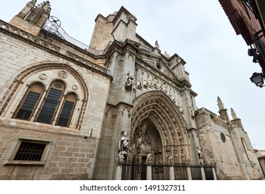 TOLEDO, SPAIN - APRIL 24, 2018: Horizontal panorama of the Portal of the Lions, the most modern gate of the Primal Cathedral of Saint Mary of Toledo.