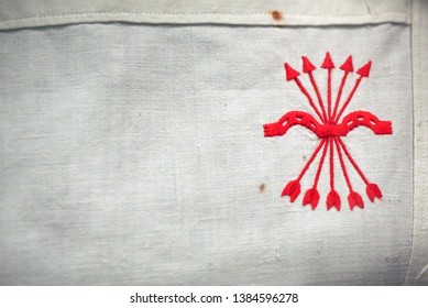 TOLEDO, SPAIN -APRIL 7, 2019: The Embroidery On An Old Uniform Depicting The Emblem Of The Francoist State In Spain Between 1936 And 1975