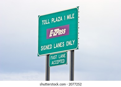 Toll Road Sign Telling Of Upcoming Toll Booth Plaza