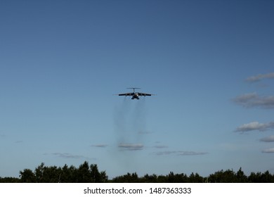 TOLMACHEVO, NOVOSIBIRSK, RUSSIA - 25 AUGUST 2019: Il-76 Landing In Blue Sky At Novosibirsk, Tolmachevo Airport.