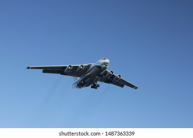 TOLMACHEVO, NOVOSIBIRSK, RUSSIA - 25 AUGUST 2019: Il-76 Landing In Blue Sky At Novosibirsk, Tolmachevo Airport.