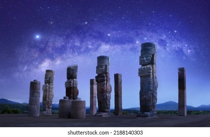 Toltec sculptures in Tula against the background of the starry sky, Mexico