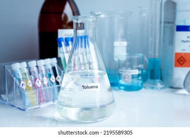 Toluene in glass, chemical in the laboratory and industry