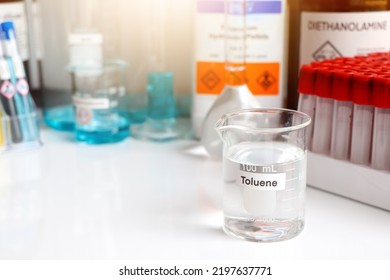 Toluene in glass, chemical in the laboratory and industry