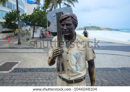 Tom Jobim conductor's statue on the edge of ipanema beach. rio de janeiro