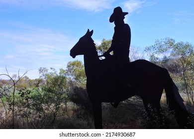 TOM PRICE, JUNE 16 2022:Silhouette Of Australian Farmer Riding A Horse In The Outback Of Western Australia.The Agricultural History Of Western Australia's Golden Outback Begins In The Late 1800s