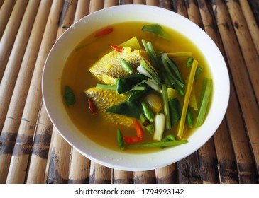 Tom Som Pla Khra Bok ( Tamarind Soup With Mullet) On Bamboo Table ,Thai Southern Style Food